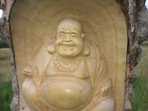 Chinese Laughing Buddha in Tree Carving